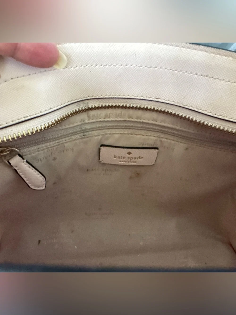 kate spade cream satchel with black trim